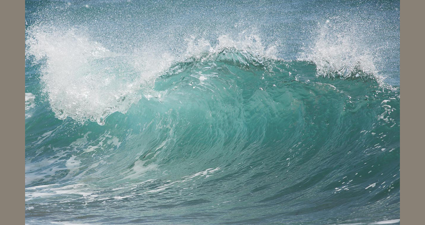 Crystal Wave Light green blue wave crested in white curls towards breaking